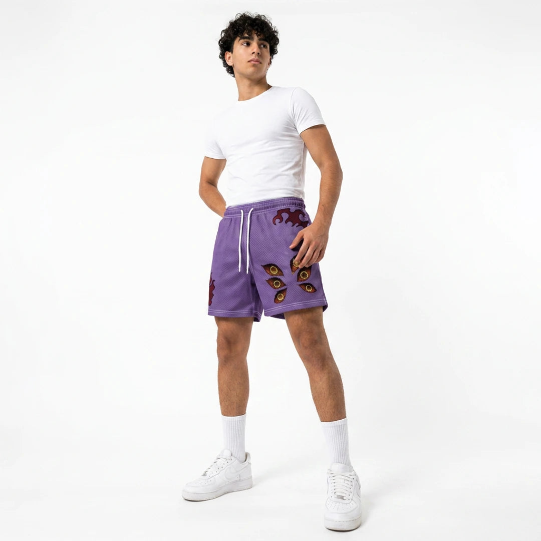 Person wearing purple shorts with decorative elements on a white background