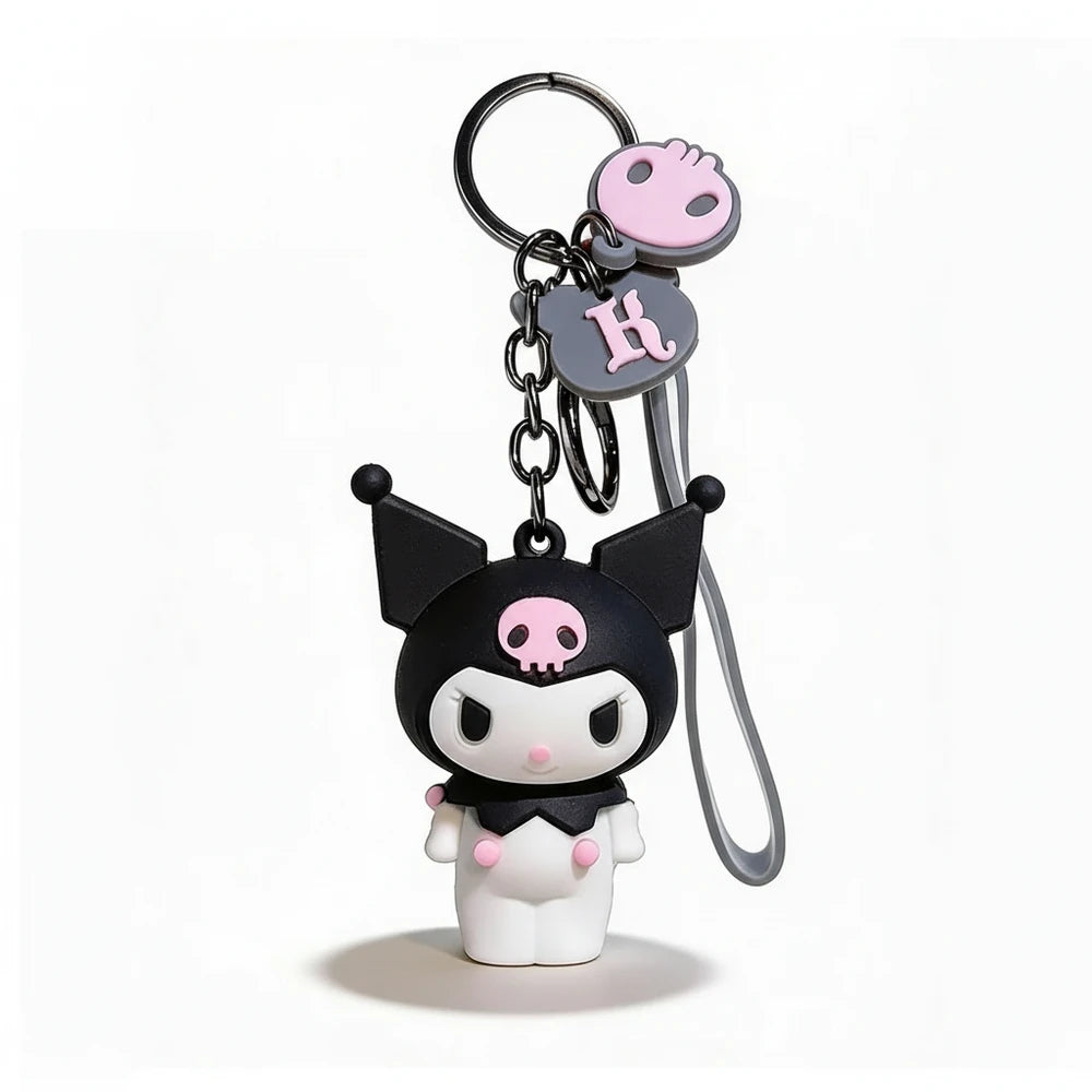 Cartoon character keychain with black hair and pink accents on a white background