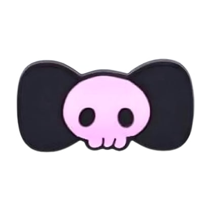 Black bow with a pink skull in the center on a white background
