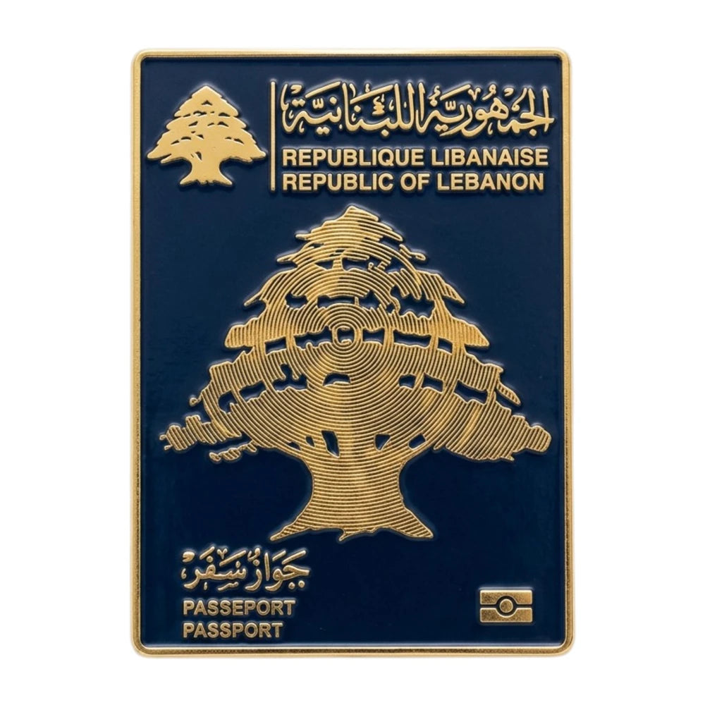 Lebanese passport cover with gold tree design on a blue background