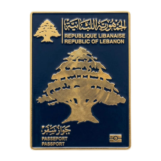 Lebanese passport cover with gold tree design on a blue background