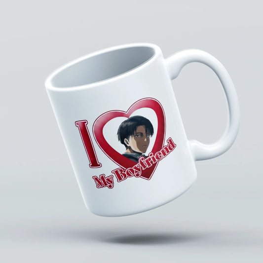 A white ceramic coffee mug with a printed graphic that reads 'I [heart] My Boyfriend' with an anime-style character portrait inside the heart, shown floating against a light gray background.