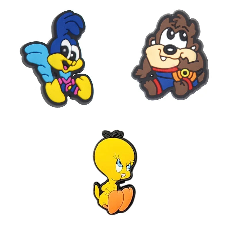 Three cartoon character figurines on a white background