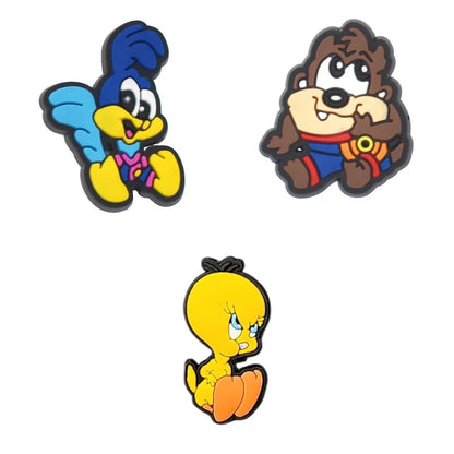 Three cartoon character figurines on a white background