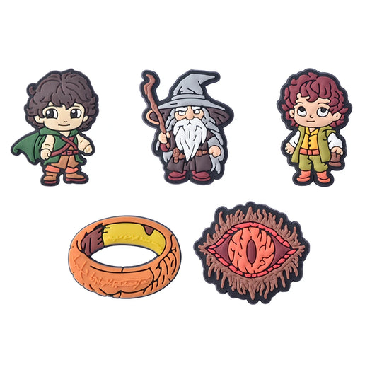 Set of cartoon character figurines and a ring on a white background