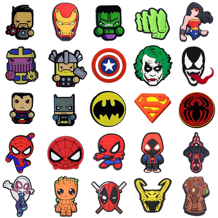 Collection of superhero-themed pins and badges on a white background