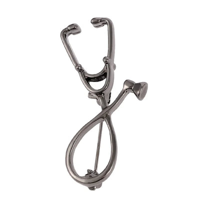 Metallic stethoscope-shaped keychain on a white background