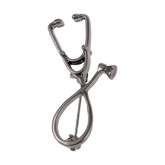 Metallic stethoscope-shaped keychain on a white background