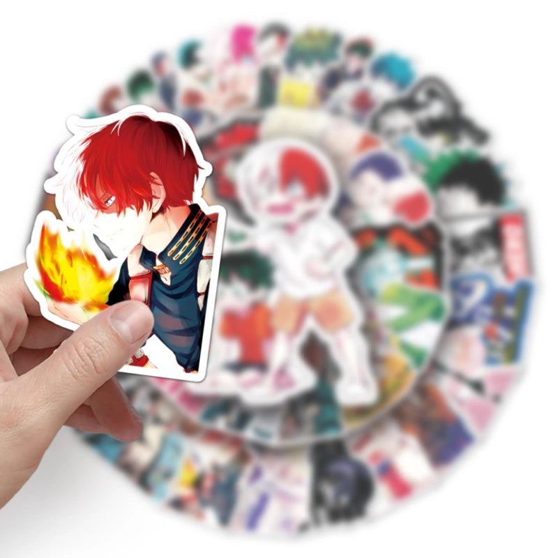 Sticker of an anime character with red hair held by a hand, with a collection of other stickers in the background.