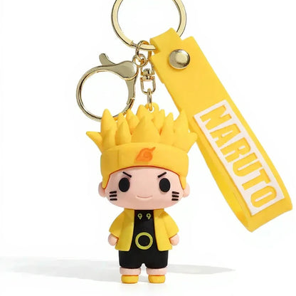 Keychain with a character wearing a yellow outfit and helmet, attached to a yellow tag with 'Naruto' text.