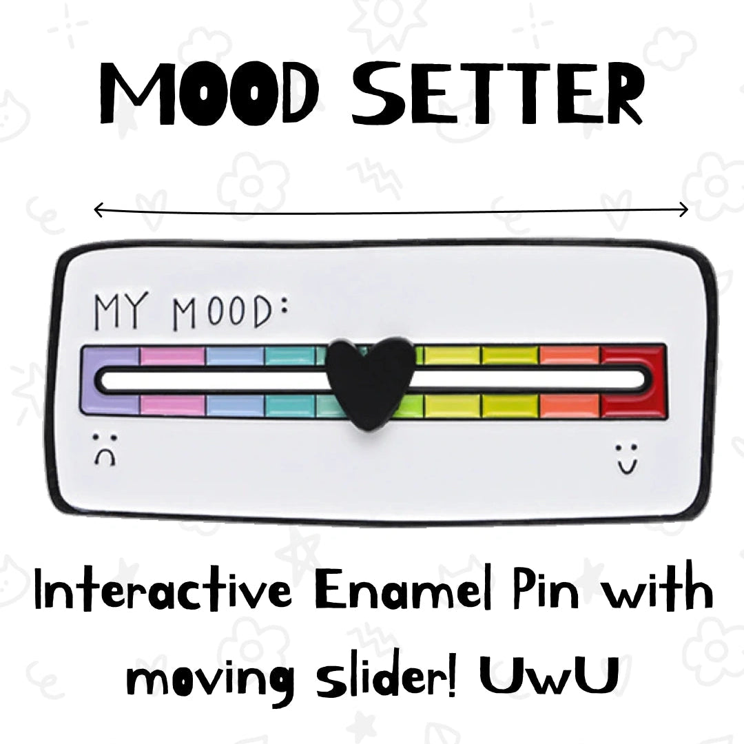An enamel pin designed as a 'Mood Setter' slider, featuring a white rectangular base with a colorful pastel gradient bar, a black heart-shaped slider in the center, and cute face icons at the ends. The product is shown with descriptive text on a white background with faint doodle patterns.