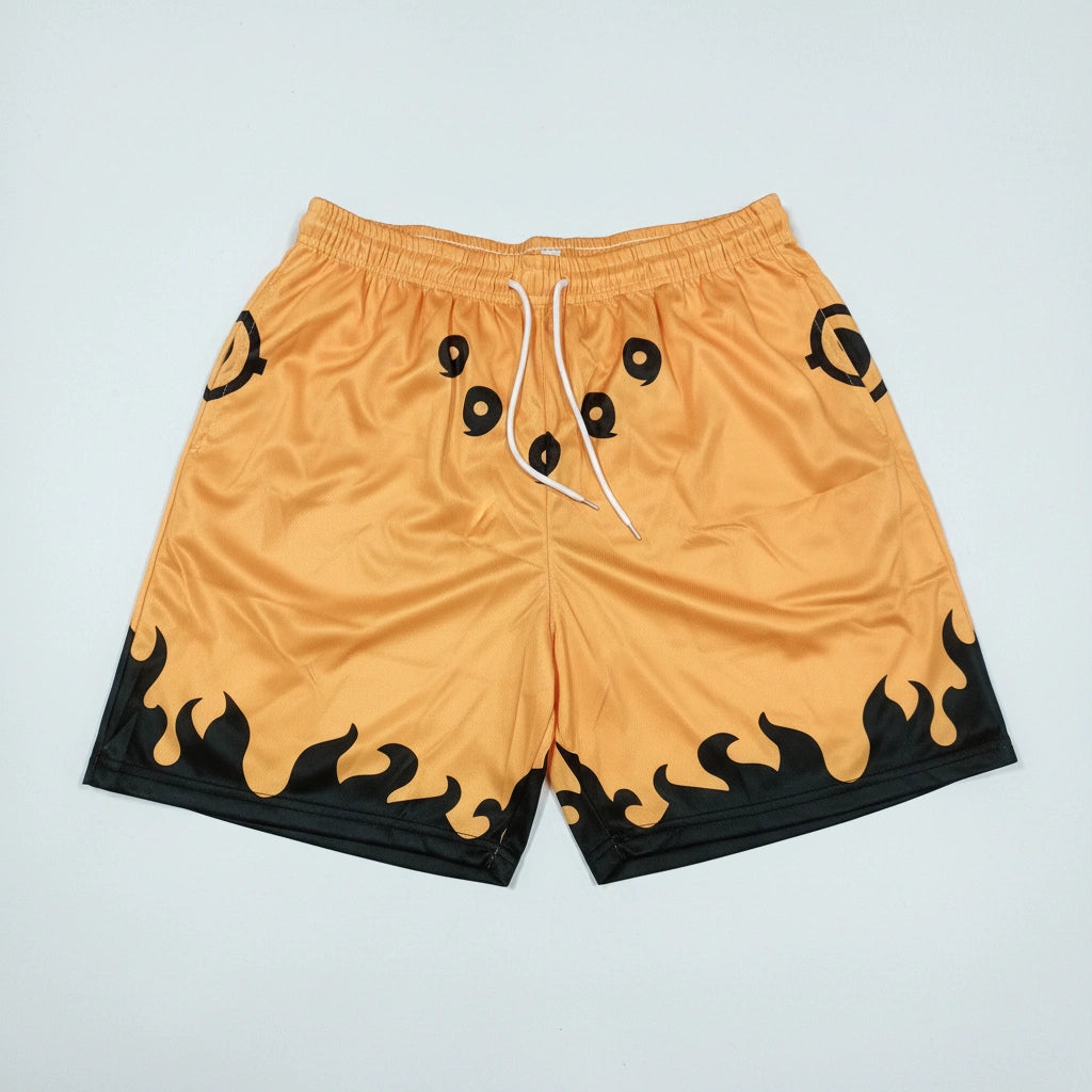 Orange shorts with black flame patterns on a light gray background