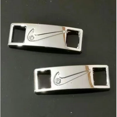 Silver Nike Metal Plate Shoe Accessory