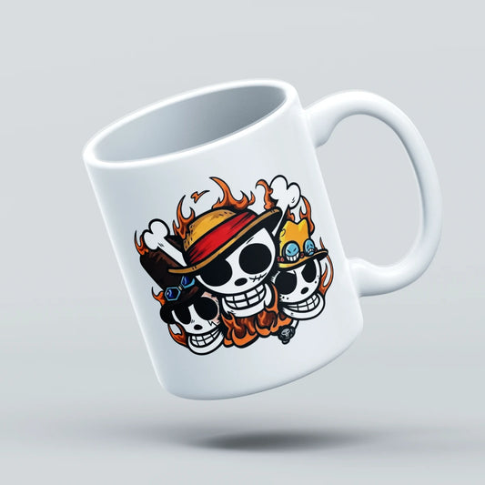 A white ceramic coffee mug featuring a cartoon graphic of three skulls wearing straw hats with flames, floating against a light gray background.