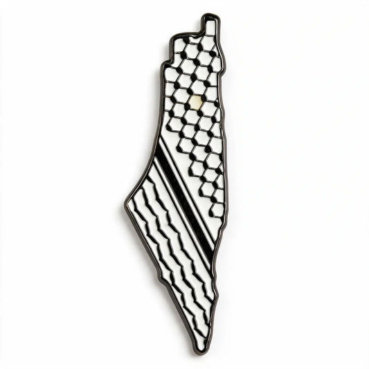A map-shaped enamel pin of Palestine, featuring a black and white geometric pattern with a honeycomb design on one side and wavy stripes on the other, set against a plain white background.