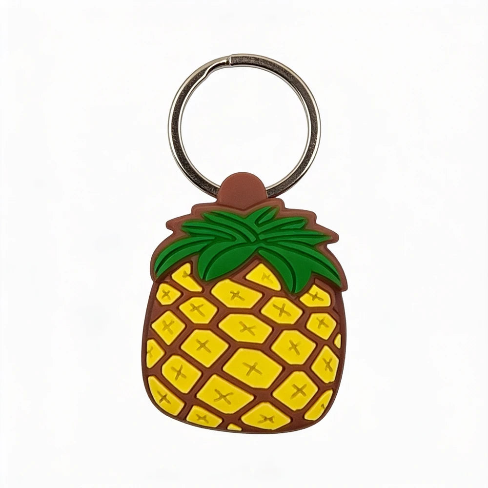 Pineapple-shaped keychain on a white background