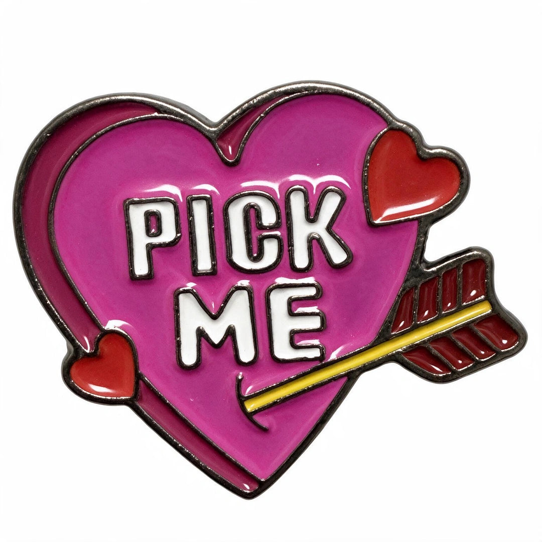 A heart-shaped enamel phone sticker with the words 'PICK ME' in white letters, featuring a pink background, red hearts, and a red-and-gold arrow, shown on a plain white background.