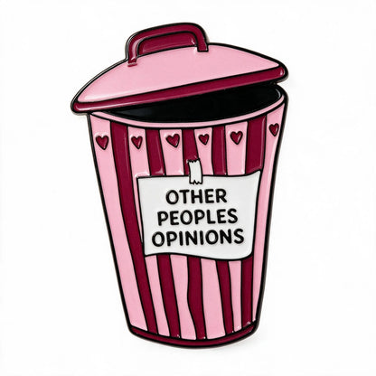 A novelty enamel phone sticker shaped like a pink and burgundy striped trash can with the text 'OTHER PEOPLES OPINIONS' on a white sign, shown on a plain white background.