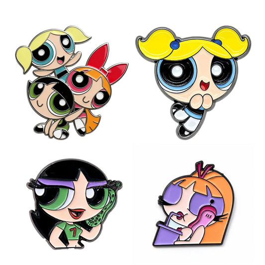Four cartoon enamel pins featuring the Powerpuff Girls in different poses on a plain white background.