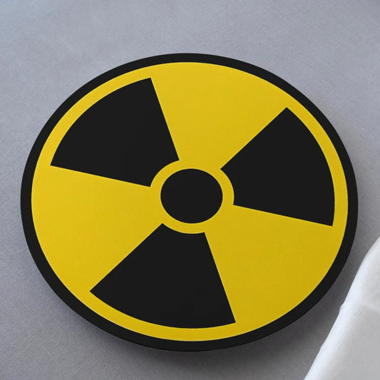 Radiation warning symbol on a gray background