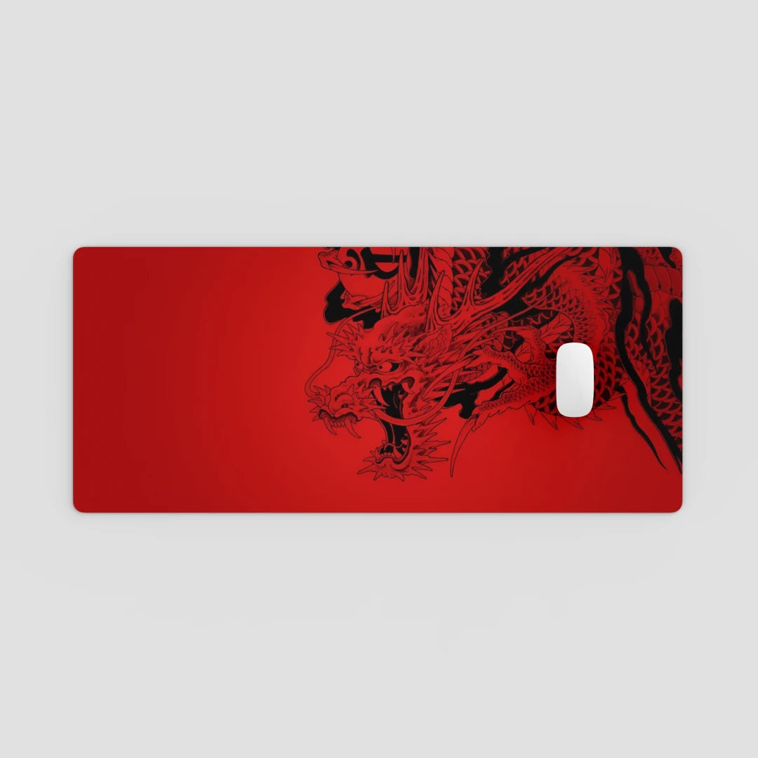 Red mouse pad with black dragon design on a light gray background