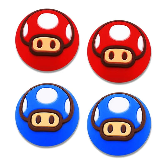 Four mushroom-shaped buttons, two red and two blue, on a white background.
