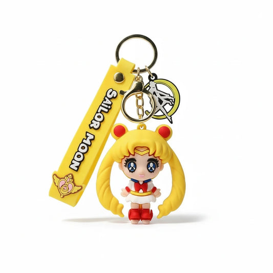 Keychain with Sailor Moon character and yellow strap on a white background
