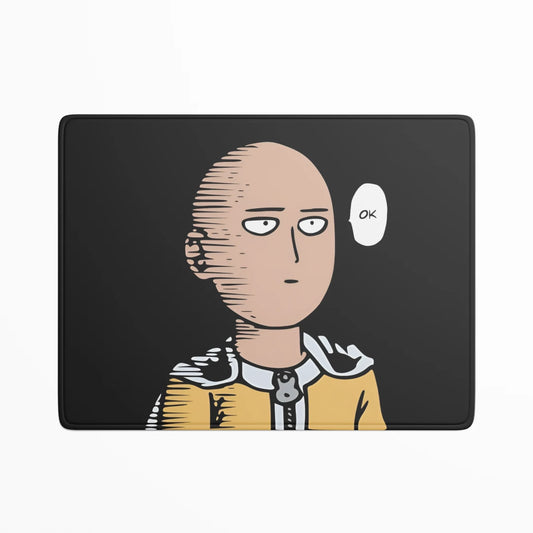 Laptop skin with a stylized character design on a black background