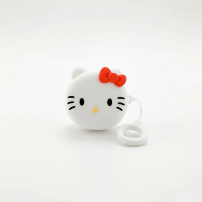 White cat-shaped keychain with a red bow on a white background