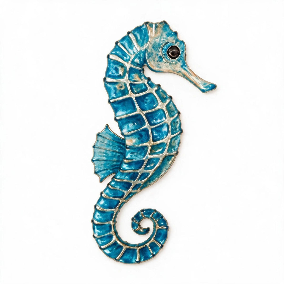 A seahorse-shaped decorative phone sticker with a glossy blue and turquoise enamel finish, outlined in gold-toned metal, set against a plain white background.