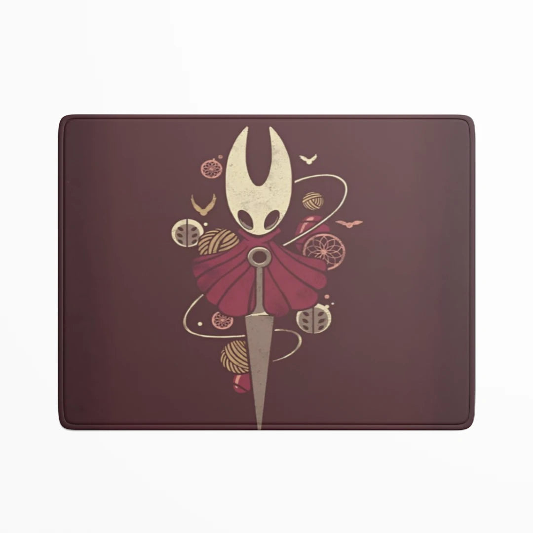 Decorative mat with a stylized design of a character holding a sword on a maroon background