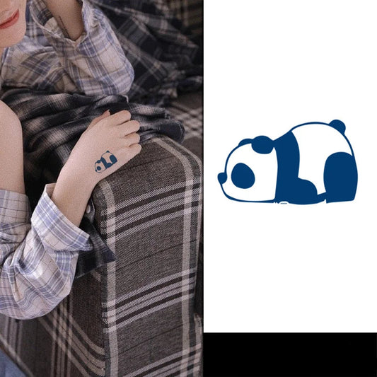 sleeping panda temporary tattoo on womans hand