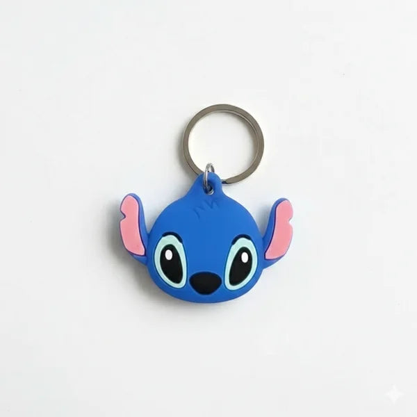 Blue cartoon character keychain with pink accents on a white background