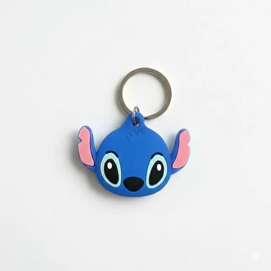 Blue cartoon character keychain with pink accents on a white background