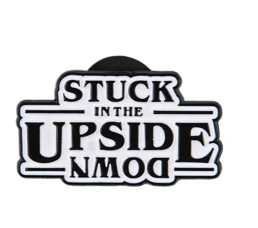 Sticker with 'Stuck in the Upside Down' text on a white background