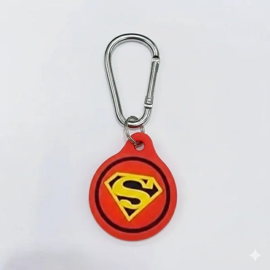 Superman logo keychain on a white background