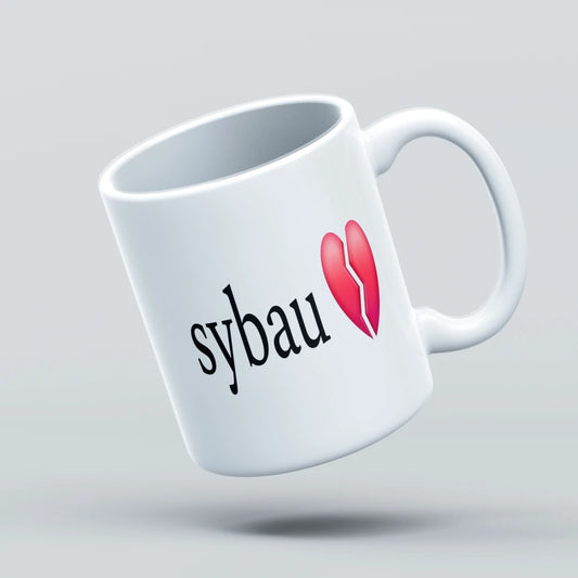 White mug with 'sybau' text and red heart design on a light gray background