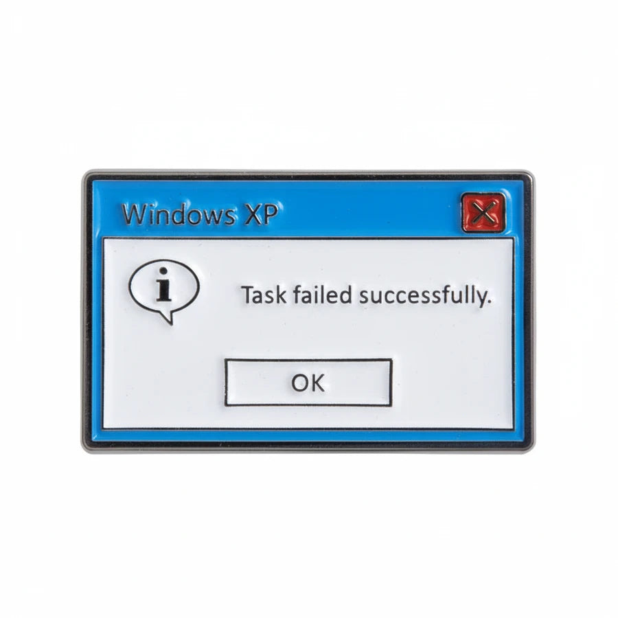 Enamel pin with a Windows XP error message design on a white background