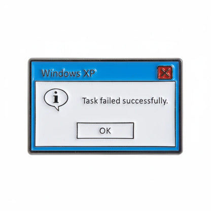 Enamel pin with a Windows XP error message design on a white background