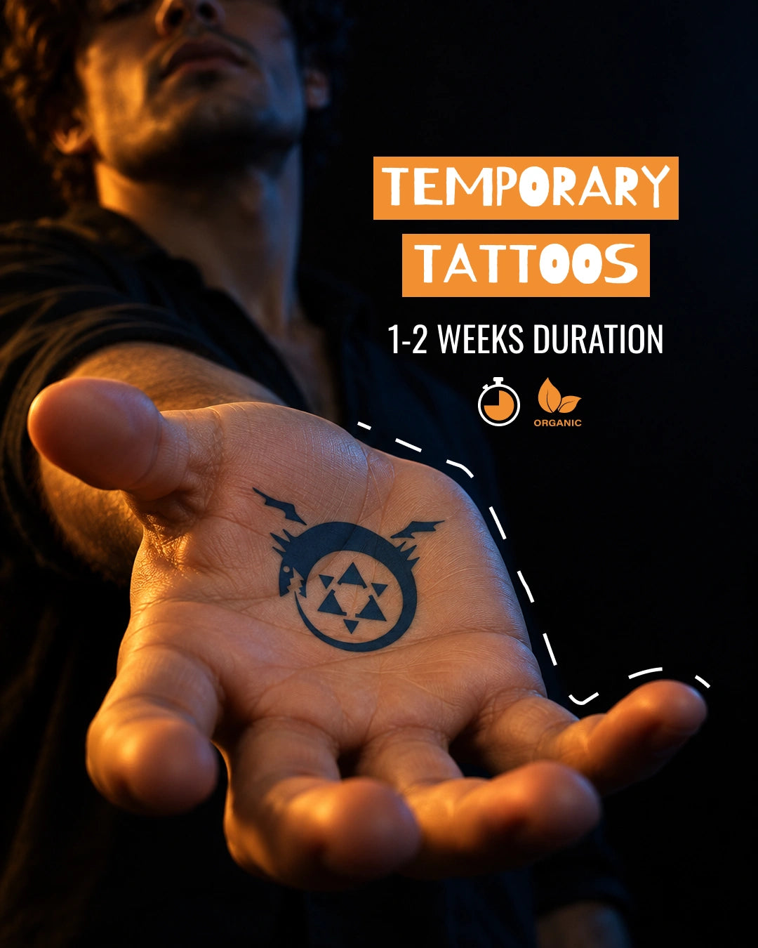 A man extends his hand toward the camera, showing a homonculus from FMAB ANIME temporary tattoo of a Star of David with bats on his palm. The background is dark, and text on the right reads 'TEMPORARY TATTOOS 1-2 WEEKS DURATION' with the brand name 'ORGANIC' visible.