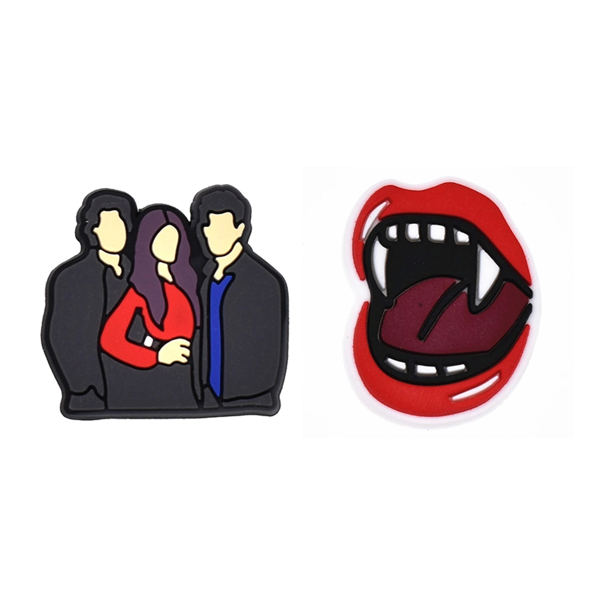 Two croc pins on a white background, one depicting a group of people and the other a mouth with fangs.