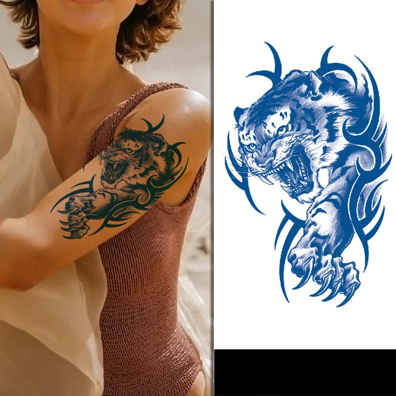Tattoo design of a roaring tiger on a person's arm, with a blue tattoo design of a tiger on a white background.