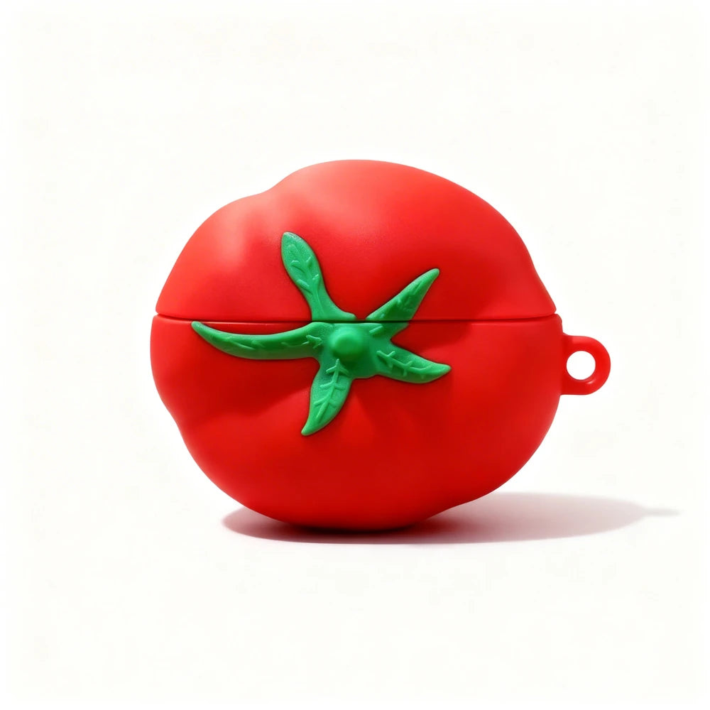 Red tomato-shaped case with green leaves on a white background