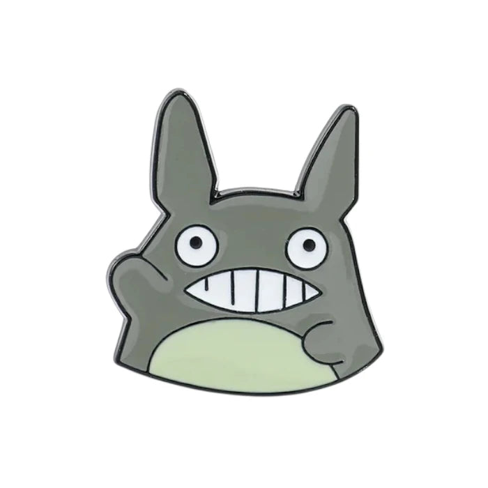 Cartoon character head with large ears and a wide smile on a white background