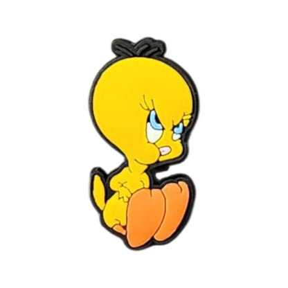 Cartoon character with a yellow body, orange feet, and black hair bun on a white background
