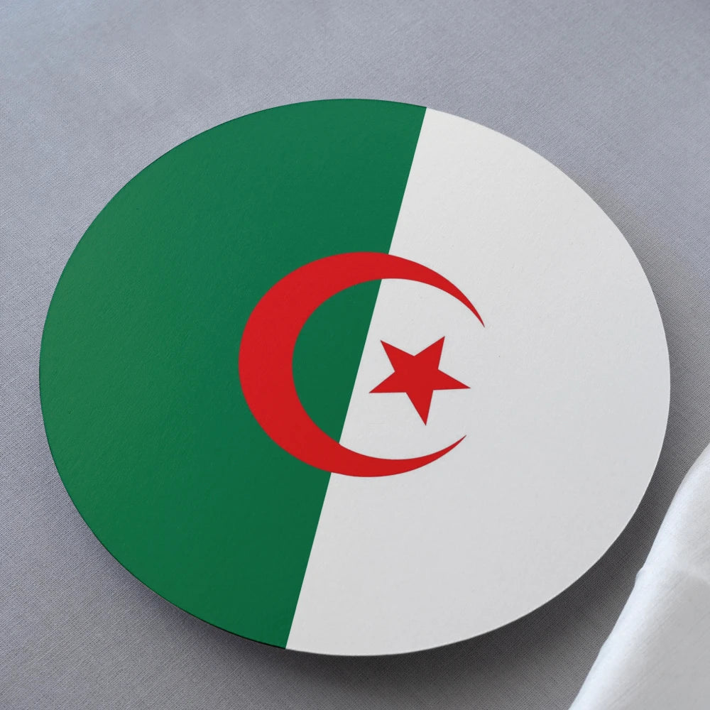 Round coaster with green and white design featuring a red crescent and star on a gray background