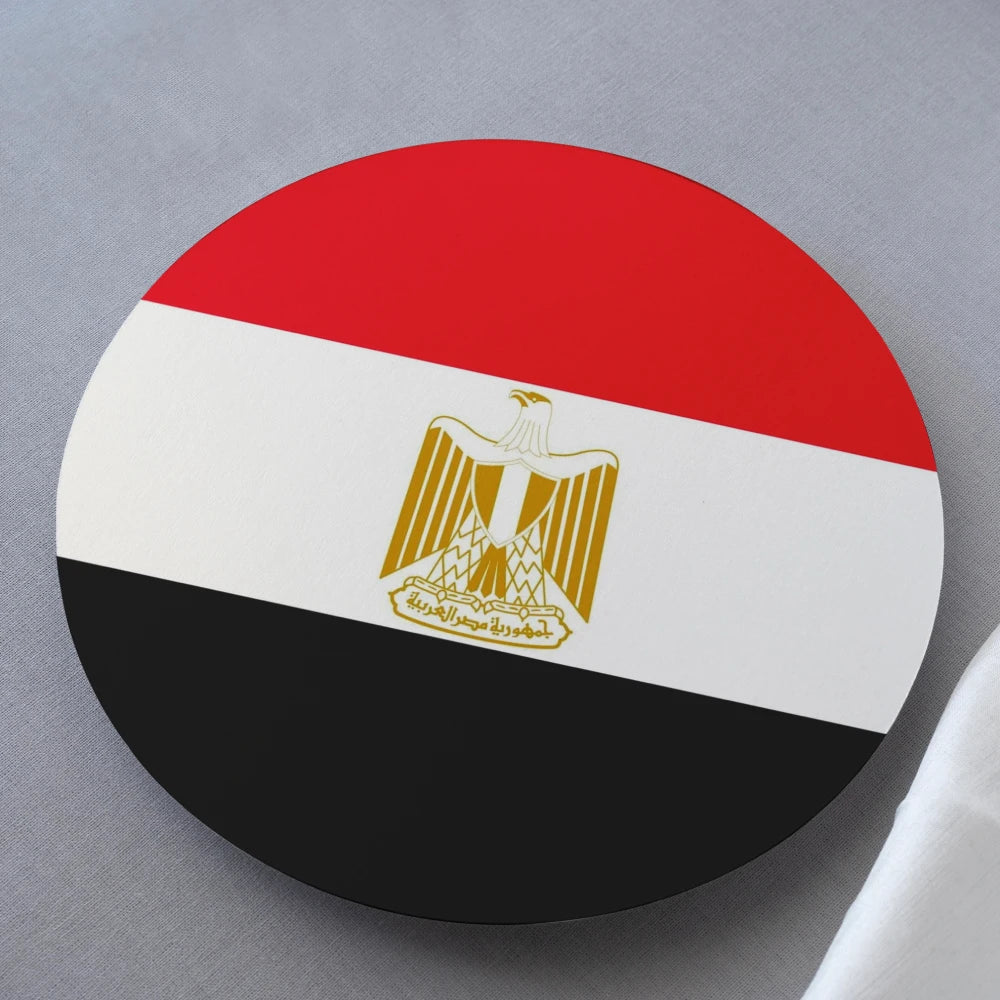 Round sticker with the flag of Egypt on a gray background