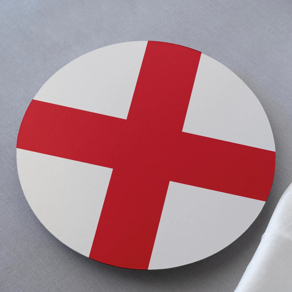 Round coaster with a red cross on a white background