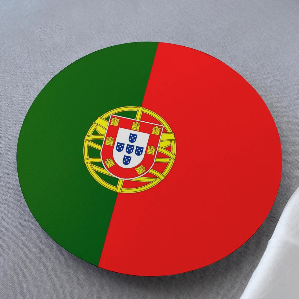 Round coaster with green and red design featuring a central emblem on a gray background
